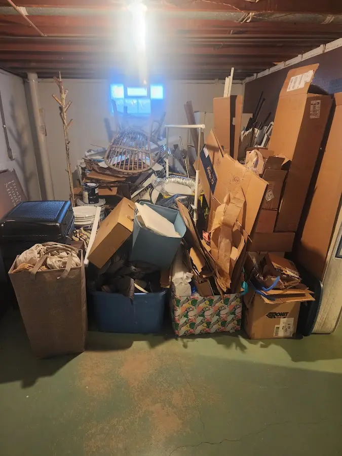 Roll-off dumpster container at job site for 6 Yard Dumpster Rental in Potterville